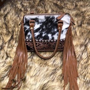 Myra leather,tooled and hair on cowhide  bag